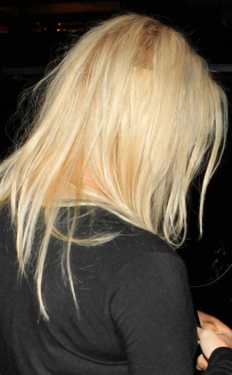 Jessica Simpson Accidentally Flashes Hair Extensions At LAXBut Her Body Still Looks Amazing
