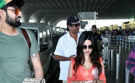 riya sen and husband shivam tewari spotted at mumbai airport