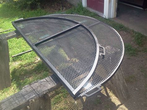 We use this fire pit, which packs down. Fire Pit Grate