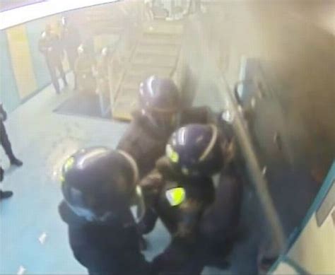 Dramatic Moment Suicidal Prisoner Armed With Razor Sets Fire To Cell As Officers Battle To