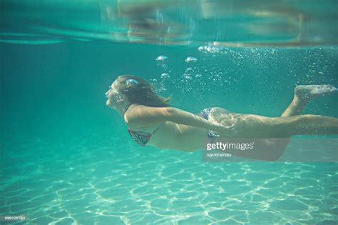Girl Diving Underwater Photo Getty Images