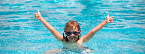 Child Raised Hands In Summer Swimming Pool Active Kids Healthy