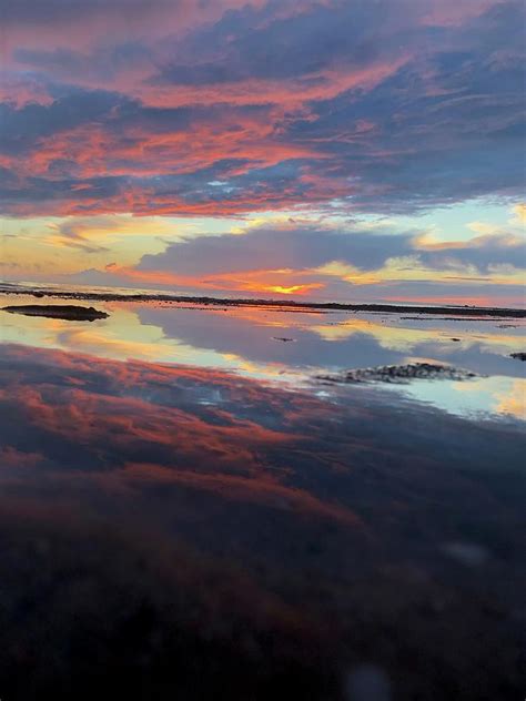 Reflections Of Sunset At Herring Cove Beach In Provincetown Photograph