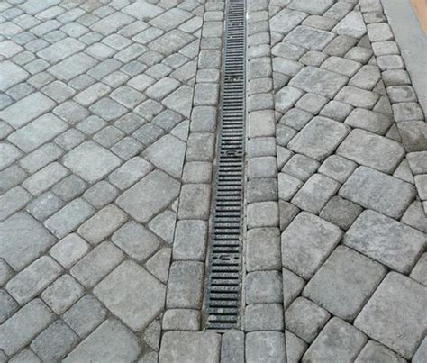 Channel drain in paver driveway, sump pump, patio drain, french drain. Colors, Drainage solutions and Patio on Pinterest