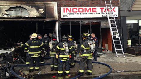 Cops Firefighters Rescue 2 From Burning Long Island Building Fire