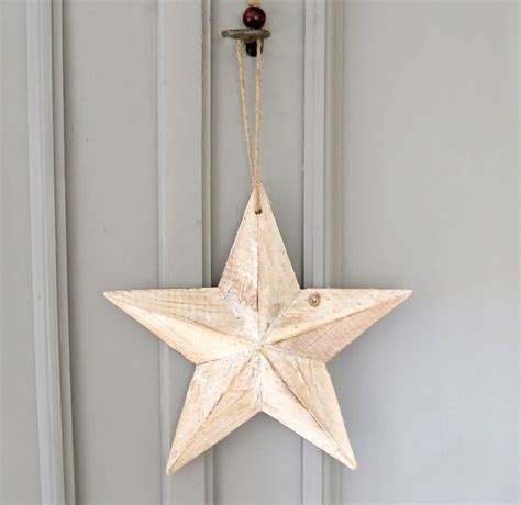 Wooden Hanging Star By Red Lilly