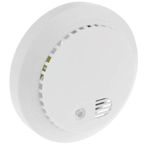 Locate the addressable data card that is residing on the circuit board in the detector. Smoke alarm detector for ceiling mount DB051 - Cablematic