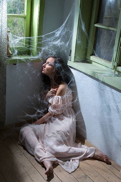 Woman Caught In Spiderweb Stock Photos Pictures And Royalty Free Images