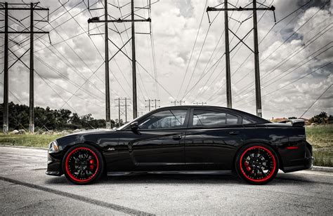 It has gcc specs and seats 5 people. Darth Vader Inspired All-Black Dodge Charger — CARiD.com ...