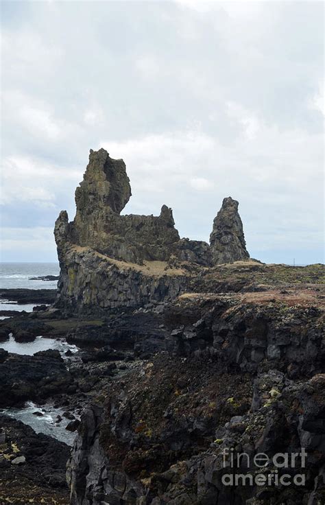 A Look At Rugged Londrangar Rock Formation In Iceland Photograph By