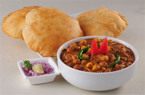 Chole bhature, is a combination of chana masala and fried bread called bhatoora from. Chole Bhature - Dil-E-Punjab