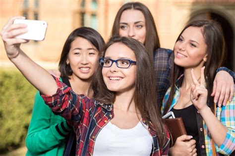 Premium Photo Female Students Are Making Selfie