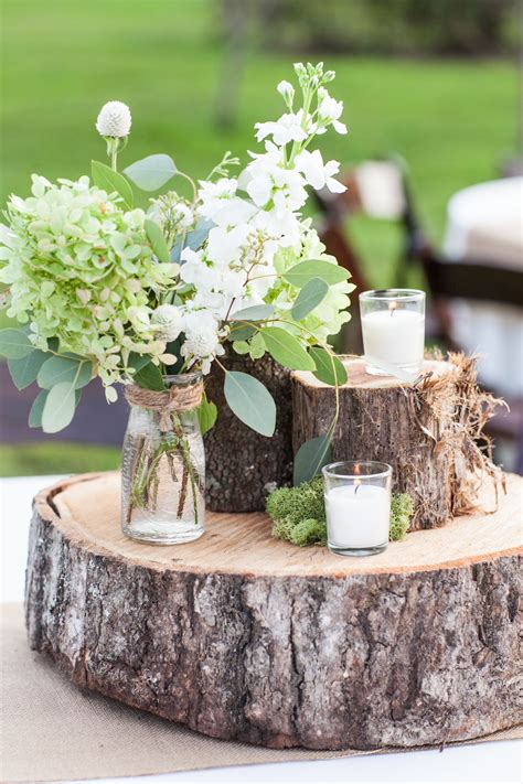 Rustic Farm Wedding Tree Trunk Centerpieces Candles Moss Flowers