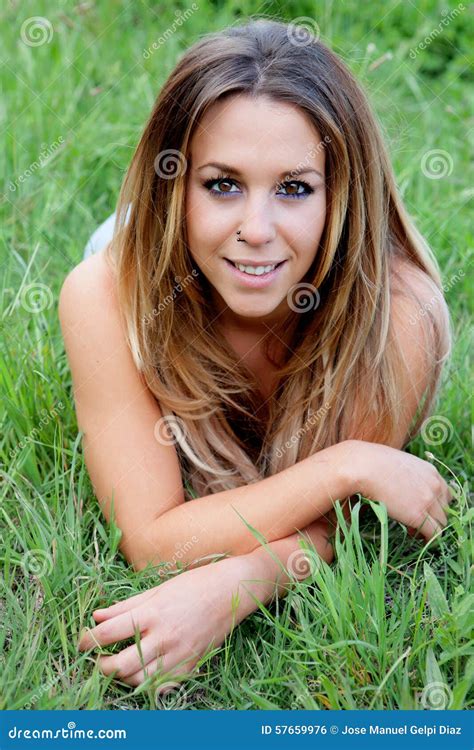 Beautiful Woman Lying On The Grass Stock Photo Image Of Field Casual