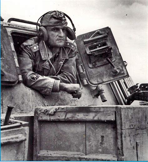 A Stug 3 Commander Looks Out The Rear Hatch Of His Tank German Soldiers