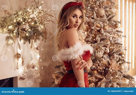 Beautiful Blonde Woman Posing In Santa Claus Costume Stock Image Image Of Beauty Holiday