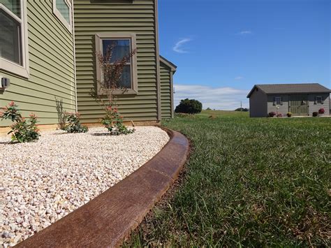 Concrete borders can be used to define your lawn, flower beds and pathways, adding a clean, finished look to your landscaping. Concrete Curbing | Decorative Concrete Edging | Stamped Concrete Curbing