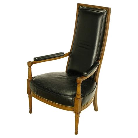 Maybe you would like to learn more about one of these? Heritage Walnut and Black Leather High Back Arm Chair at ...