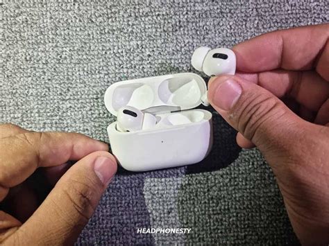 Airpods Flashing Green What It Means And How To Fix It Fast Headphonesty