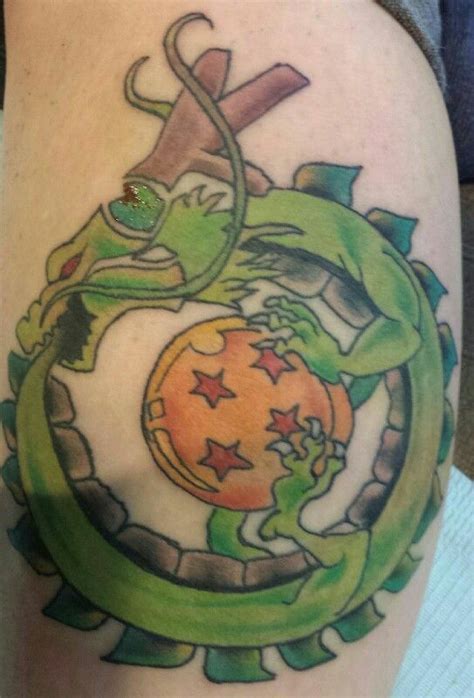 4 star dragon ball tattoo. Shenron holding a 4 Star Dragonball | Tatuagens, Tatoo, Tatuagem