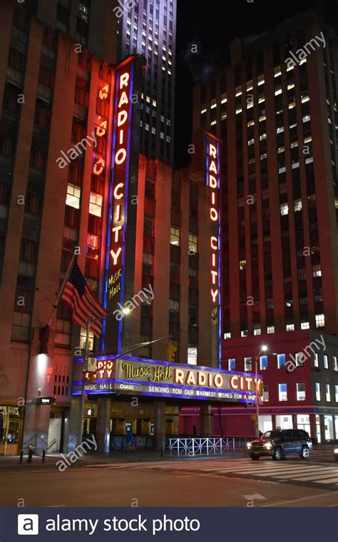 The Iconic Radio City Music Hall Sign At Night Stock Photo Alamy