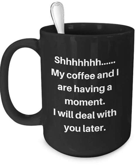 a black coffee mug with the words shihnh my coffee and i are having a moment i will deal with