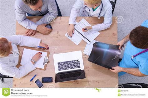 Medical Team Discussing Treatment Options With Stock Image Image Of