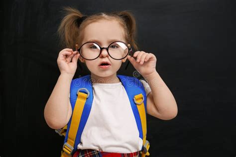 Cute Little Child Wearing Glasses First Time At School Stock Photo