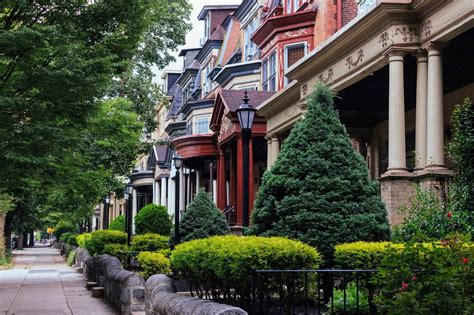 A Tree Lined Street With Victorian Era Houses In West Philadelphia
