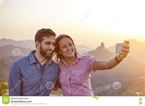 Young Couple On A Mountain Top Stock Image Image Of Healthy Hair