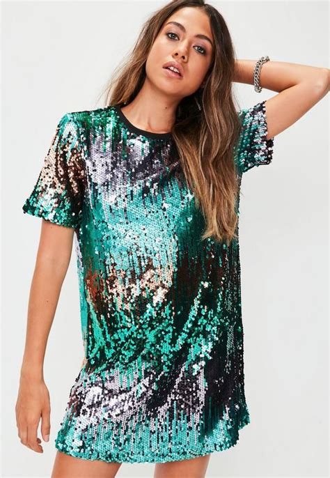 Black T Shirt Dress Featuring Black Iridescent Sequins A Round Neckline Short Sleeves And