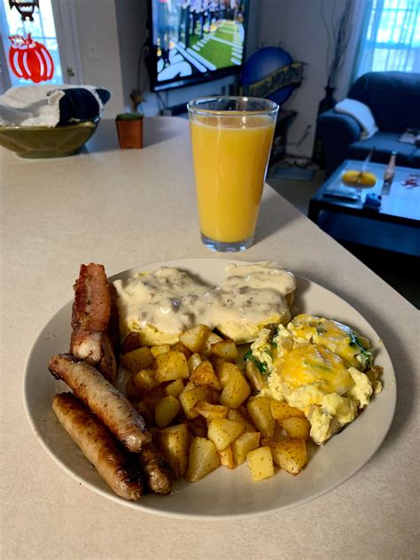 Homemade Southern Breakfast With Cheesy Scrambled Eggs Sausage Gravy