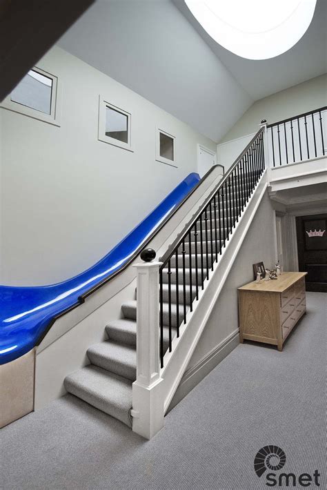 How Cool Is This Staircase With A Slide Next To It Treads And Risers