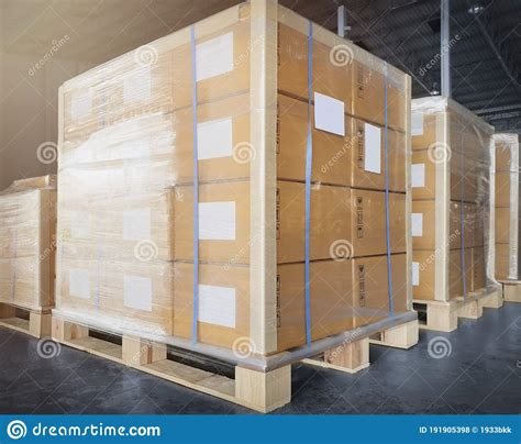 Stack Of Shipment Boxes With Electric Forklift Pallet Jack At The Warehouse Cargo Export