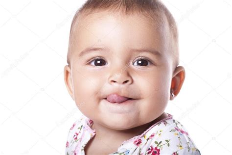 Portrait Of Lovely Baby Girl Sticking Tongue Out — Stock Photo © Erllre