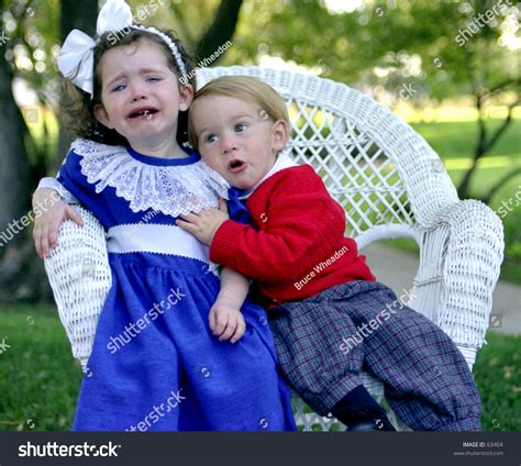Girl Crying Boy Consoling Stock Photo 63404 Shutterstock