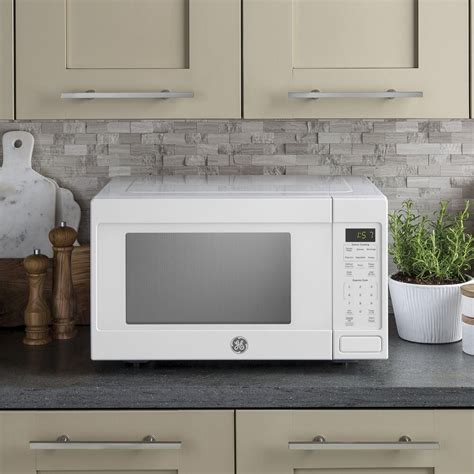 Ge Appliances 16 Cu Ft Countertop Microwave Oven In White Nebraska