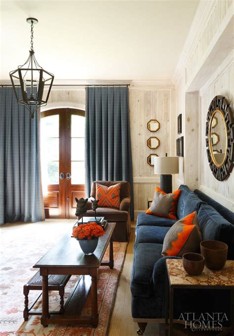 This indian summer color choice is often used for fall holiday decorations, such as halloween and thanksgiving. Practically Perfect | Living room orange, Navy living ...