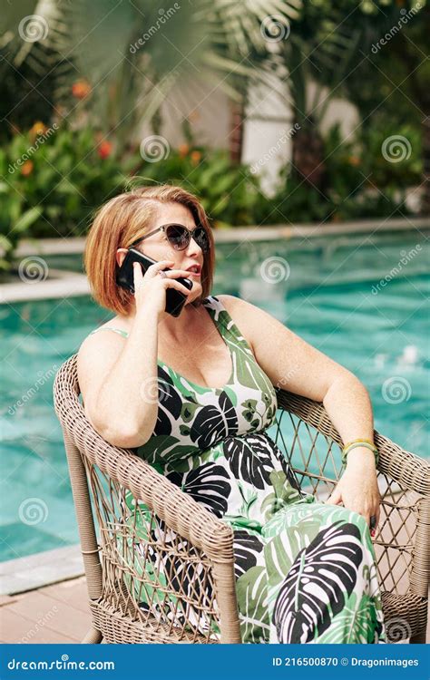 Mature Woman By Swimming Pool Stock Photo Image Of Sitting Getaway