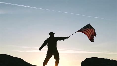 Soldier Hold American Flag Against Stock Footage Video 100 Royalty