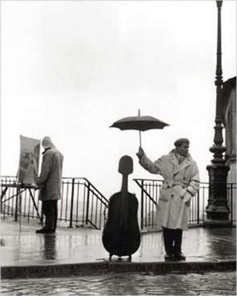 A Musician In The Rain Art Print Robert Doisneau Art Prints Buy Now