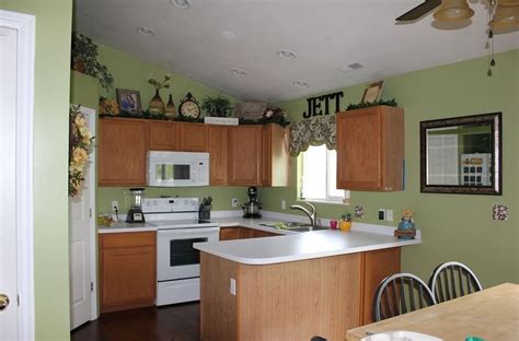 There are so many sage green paints out there! Red Kitchen Wall With Oak Kitchen Cabinet And Also White ...