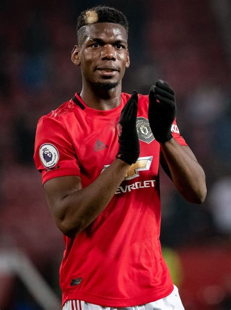 + paul pogba of manchester united celebrate following their sides victory in the premier league match between manchester united and huddersfield town at old trafford on december 26, 2018 in. Man Utd transfer news: Paul Pogba urged to make ...