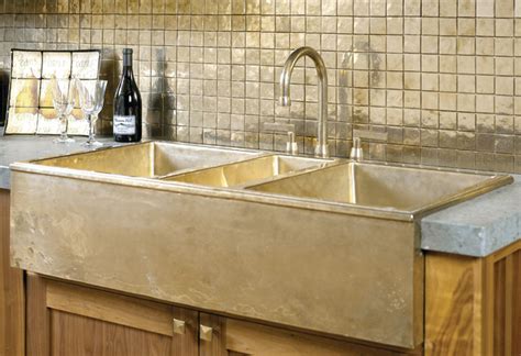 The kitchen is the most common place to have a backsplash. Bronze kitchen sink and backsplash - Traditional - Kitchen ...