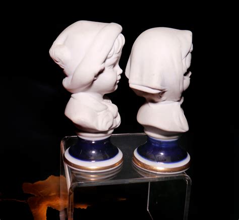 Pair Of Mid Century Capodimonte White Porcelain Bisque Busts