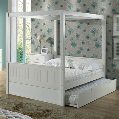 A twin canopy bed frame is considered one of life's luxuries, and it actually instructions a value when purchased. Camaflexi Twin Canopy Bed with Trundle | Wayfair.ca
