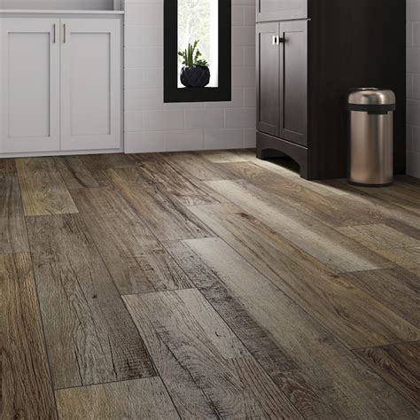 This is slightly thinner (6mm) but tougher lvp due to the rigid stone and polymer core. SMARTCORE Pro 7-Piece 7.08-in x 48.03-in Claremount Oak Luxury Vinyl Plank Flooring in the Vinyl ...
