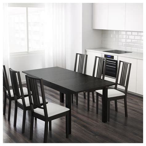 Choose an extendable dining room table for the best experience. BJURSTA extendable table, brown-black | IKEA Indonesia
