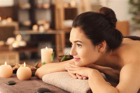 Young Woman Relaxing On Massage Table At Spa Salon Stock Image Image Of Aroma Client 150057505