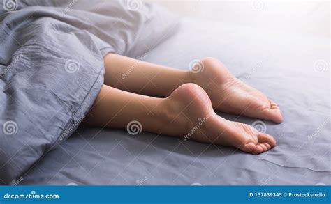 Female Beautiful Feet Under Blanket In Bed Stock Image Image Of Nude Blanket 137839345
